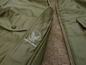Buzz Rickson Men's B-10 Flight Jacket with Red Ribbed Trim - Superior Togs Co. Model - U.S. Army Air Forces WWII Cotton Bomber Jacket Reproduction - Made in Japan (BR15745 Olive Drab)