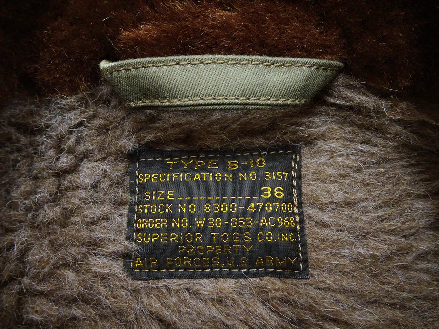 Buzz Rickson Men's B-10 Flight Jacket with Red Ribbed Trim - Superior Togs Co. Model - U.S. Army Air Forces WWII Cotton Bomber Jacket Reproduction - Made in Japan (BR15745 Olive Drab)