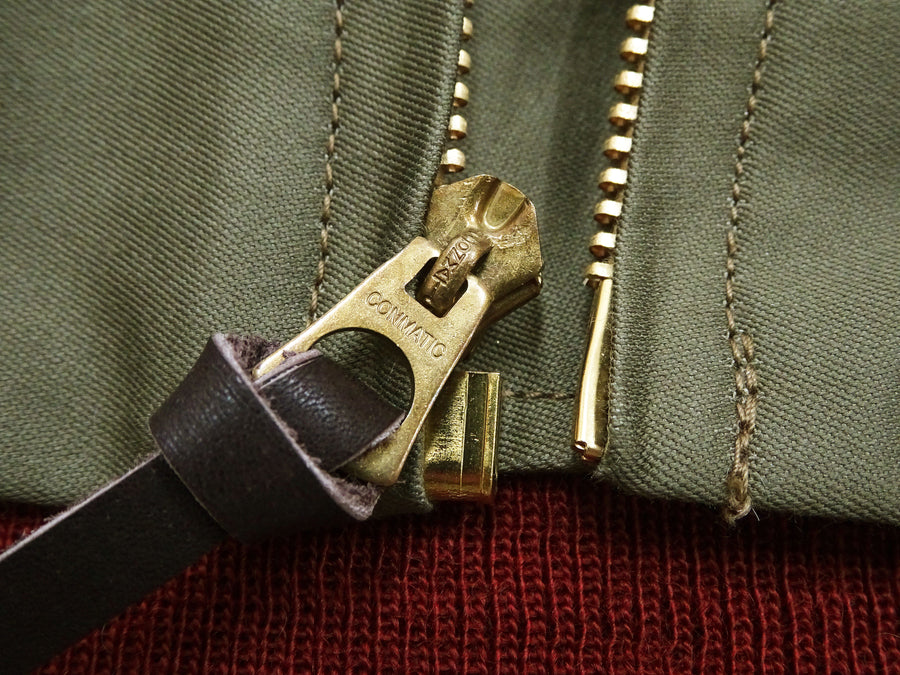 Buzz Rickson Men's B-10 Flight Jacket with Red Ribbed Trim - Superior Togs Co. Model - U.S. Army Air Forces WWII Cotton Bomber Jacket Reproduction - Made in Japan (BR15745 Olive Drab)