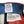 Load image into Gallery viewer, TOYS McCOY Men&#39;s Trucker Cap with Snoopy Flying Ace Patch - Side Mesh Baseball Hat, Adjustable Snapback TMA2525 Tricolor
