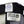 Load image into Gallery viewer, TOYS McCOY Men&#39;s Trucker Cap with Felix the Cat &amp; Beck Motorcycle Patch - Side Mesh Baseball Hat, Adjustable Snapback TMA2529 Black/Gray
